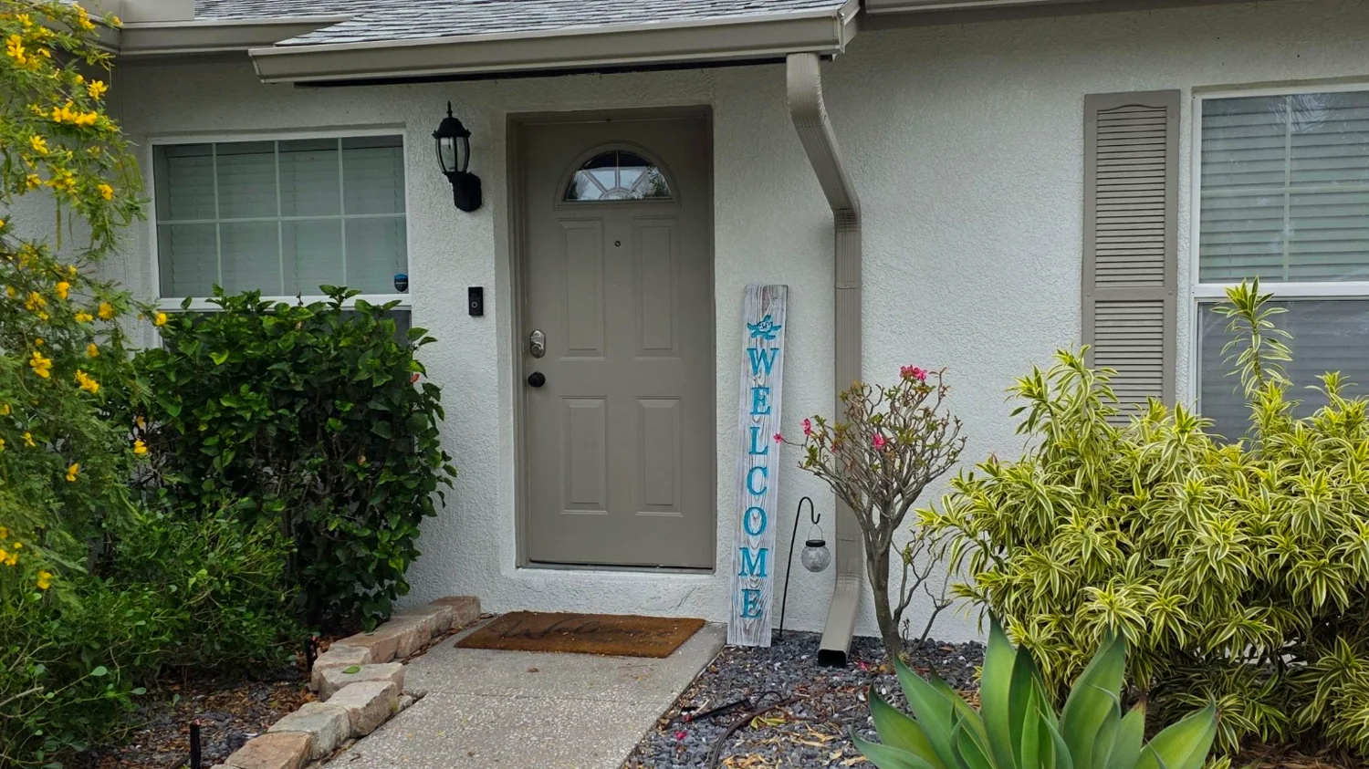 Front entry gutters and downspouts on a Brandon, FL home
